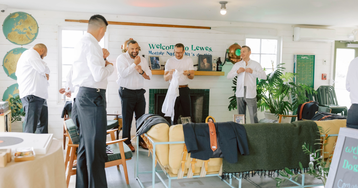 A group of groomsmen getting ready in the dogfish inn