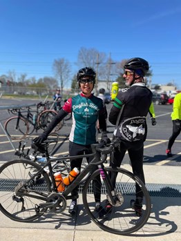 Two bikers with Dogfish apparel