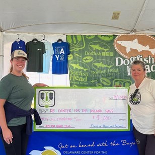Large check donation at Dogfish Dash 