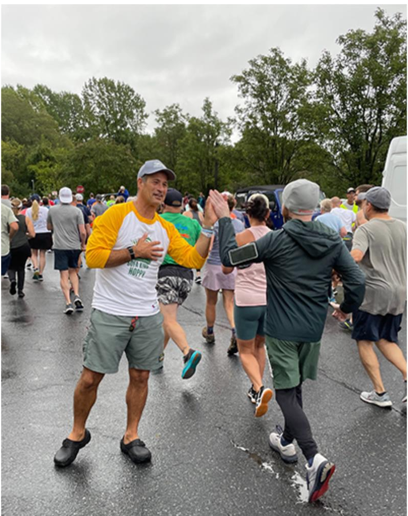 Sam Calagione Hi-fiving Dogfish Dash runners