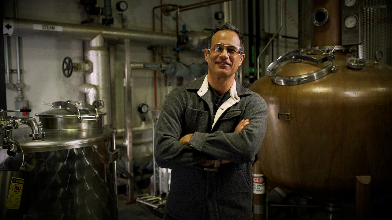 Sam Calagione at the still