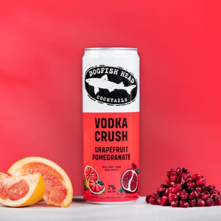 Grapefruit & Pomegranate Vodka Crush can with real grapefruit and pomegranates next to can