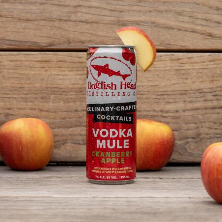 Cranberry Apple Vodka Mule can with apple garnish