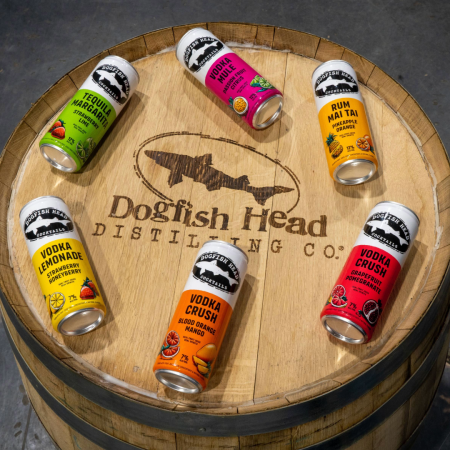 Dogfish Head cocktails on a distillery barrel