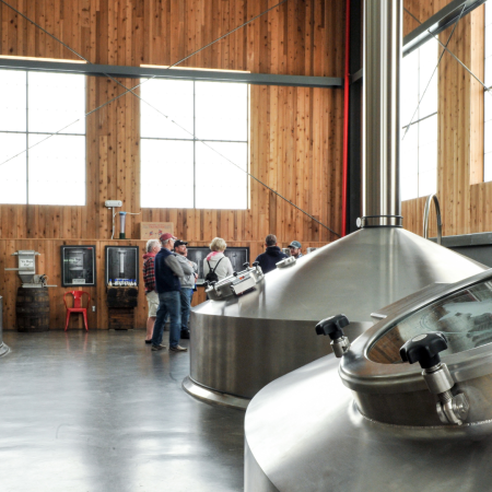 A group in brewhouse 2 of the Milton Brewery