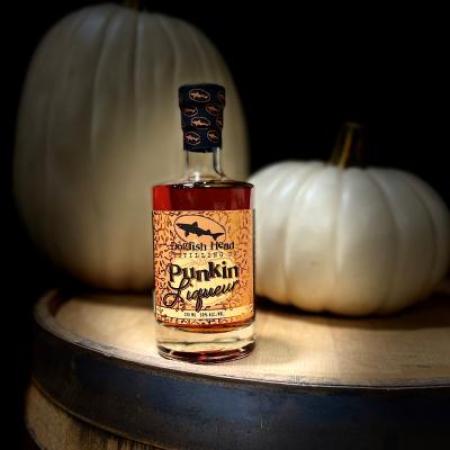 Punkin Liqueur bottle on barrel