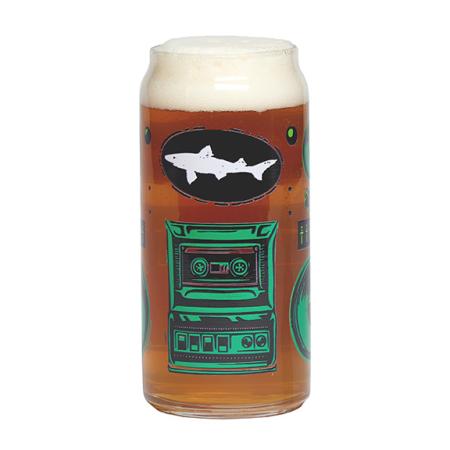 A tall boy can glass with a Dogfish Head themed retro stereo design on it. Pictured here filled up with beer.