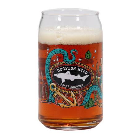 Dogfish Head can-shaped glass filled with amber beer, featuring an underwater-themed design with tentacles, anchor, and the Dogfish Head logo on the front.