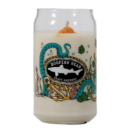 Glass filled candle featuring multi color under the see graphics. Yellow Shell wax decoration on top of candle. 