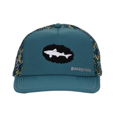 Front view of a teal Patagonia trucker hat featuring a black oval patch with a white Dogfish Head shark logo and the word "patagonia" embroidered in light gray on the front panel.