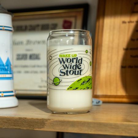 Dogfish Head World Wide Stout Can Glass Candle With Green Galaxy and Stars Graphic On The Front