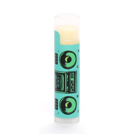 A turquoise lip balm tube featuring a retro black-and-green boombox graphic.