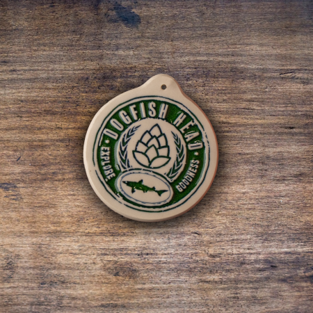 Dogfish Head Explore Goodness Ornament in White Stoneware with Imprinted Hops Design in Green