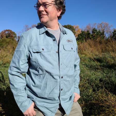 Dogfish Head and Patagonia Men's Blue Light Button Up Shirt Front View on Model