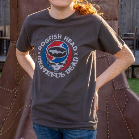 A charcoal colored tee shirt with the Dogfish Head and Grateful Dead collaboration logo on the front.