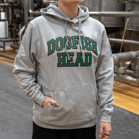 Collegiate Hoodie worn by model with green text