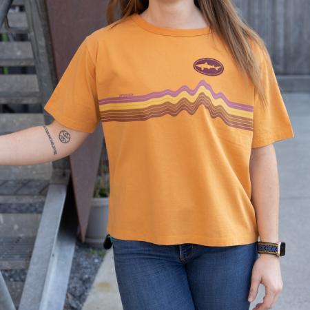 Dogfish Head and Patagonia Women's Orange Easy Cut Tee With Ridge Line Design Across The Front and Dogfish Head Shark Logo On Left Chest