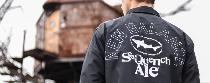 Back of SeaQuench Ale-themed New Balance jacket