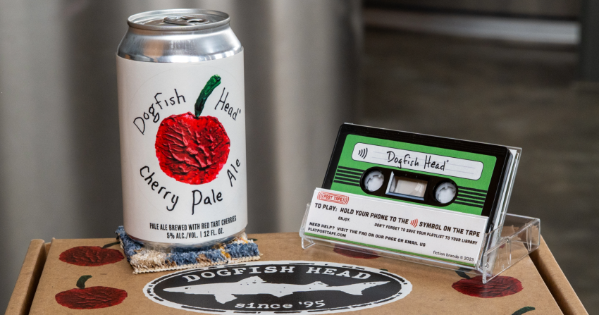 Dogfish Head Cherry Pale Ale 12oz can with a casette tape and a Dogfish Head brewing since '96 sticker
