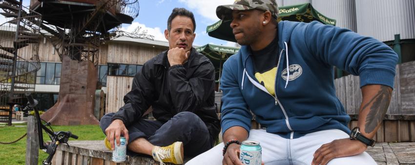 Sam Calagione & Jimmie Allen having a beer