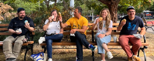 Sam and friends on a park bench