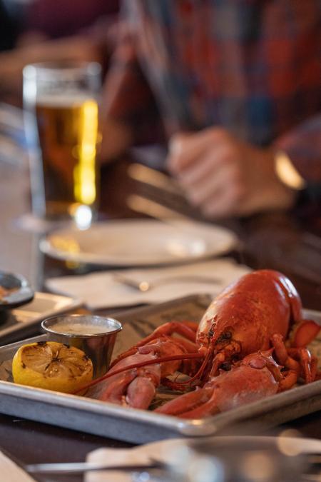 image of a whole lobster served on a platter