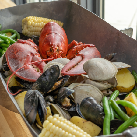 Dogfish Head Chesapeake & Maine 2024 Restaurant Week special. Seafood Keg with lobster, mussles, clams