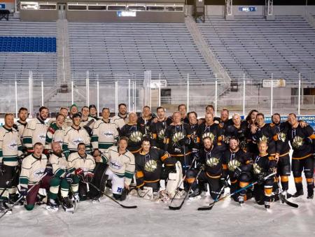 Dogfish Head hockey team standing on the ice.