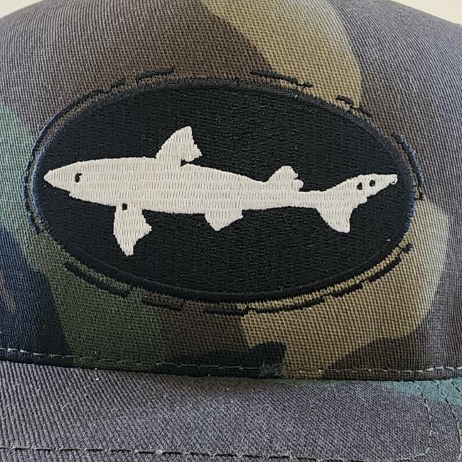 Camo trucker hat with Shark and Shield patch 