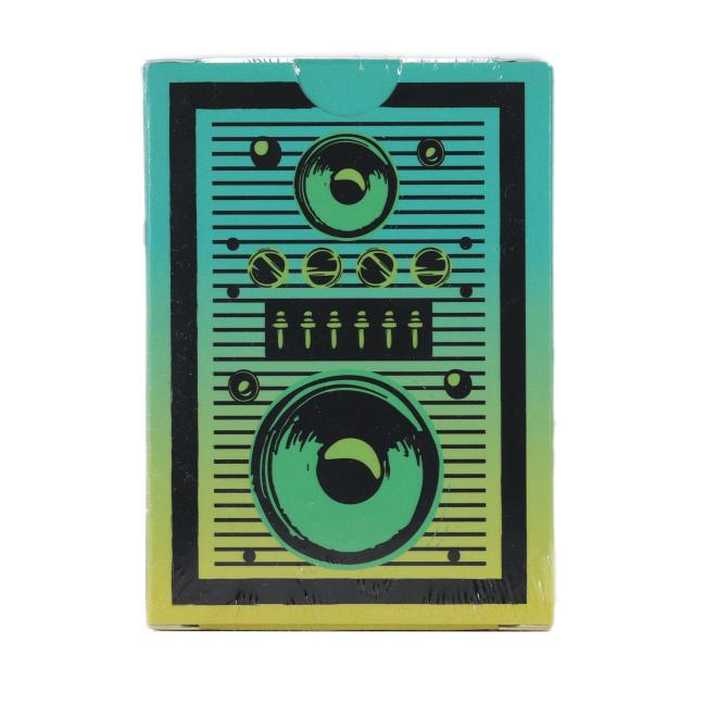 Back of the Dogfish Head playing cards box featuring a detailed retro stereo design with speakers, dials, and sliders in black on a teal-to-yellow gradient.