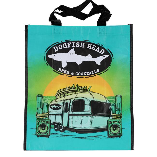 Reusable shopping tote with Dogfish Head Beer & Cocktails branding, featuring a retro trailer and sunset design on the front and colorful Dogfish Head logo patterns on the sides.