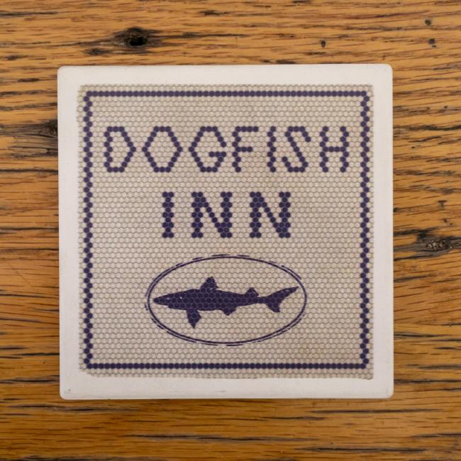 INN Coaster on table.