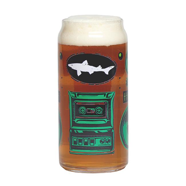 A tall boy can glass with a Dogfish Head themed retro stereo design on it. Pictured here filled up with beer.
