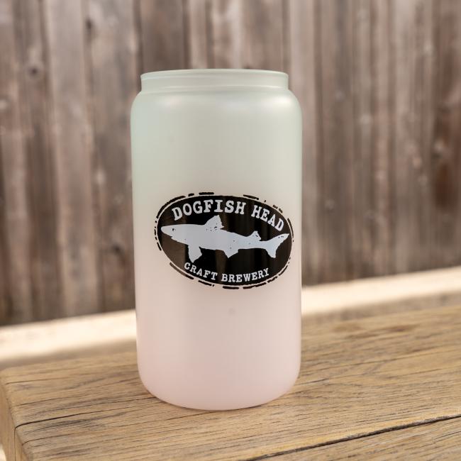 Room-temperature view of the glass in its original frosted white state with the Dogfish Head logo displayed on the front.