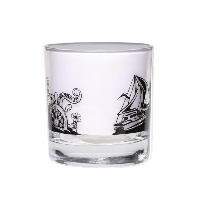 Rocks glass featuring water themed artwork