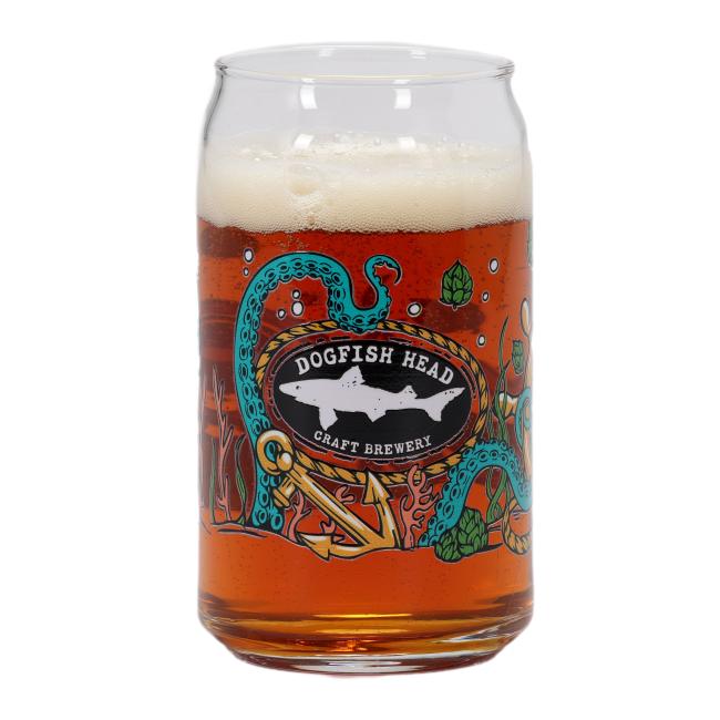 Dogfish Head can-shaped glass filled with amber beer, featuring an underwater-themed design with tentacles, anchor, and the Dogfish Head logo on the front.