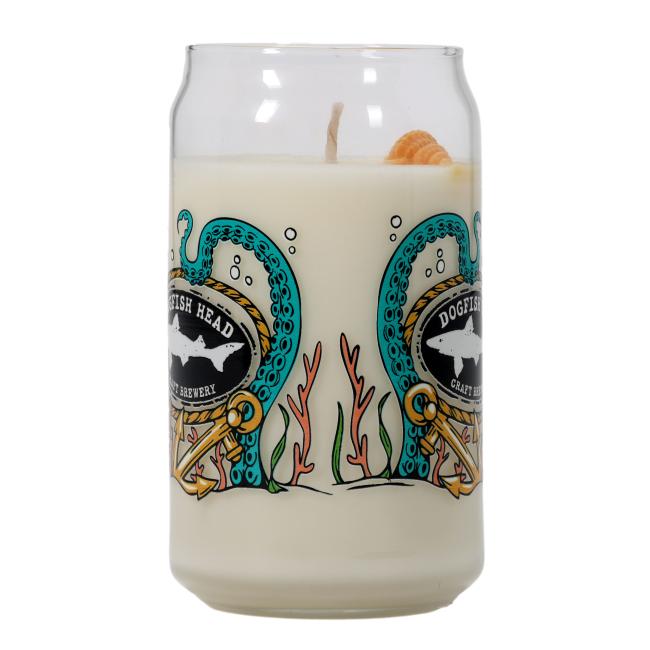 Glass filled candle featuring multi color under the see graphics. Yellow Shell wax decoration on top of candle.