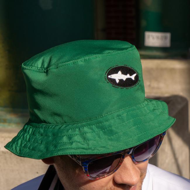 A green bucket hat with the Dogfish Head logo on the front.