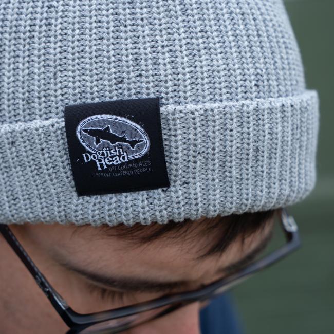 Dogfish Head Grey Fleck Beanie Front Up Close of Tag On A Model