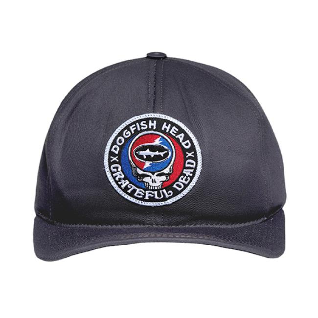 A charcoal colored flat brim hat with the Dogfish Head and Grateful Dead collaboration logo on the front.
