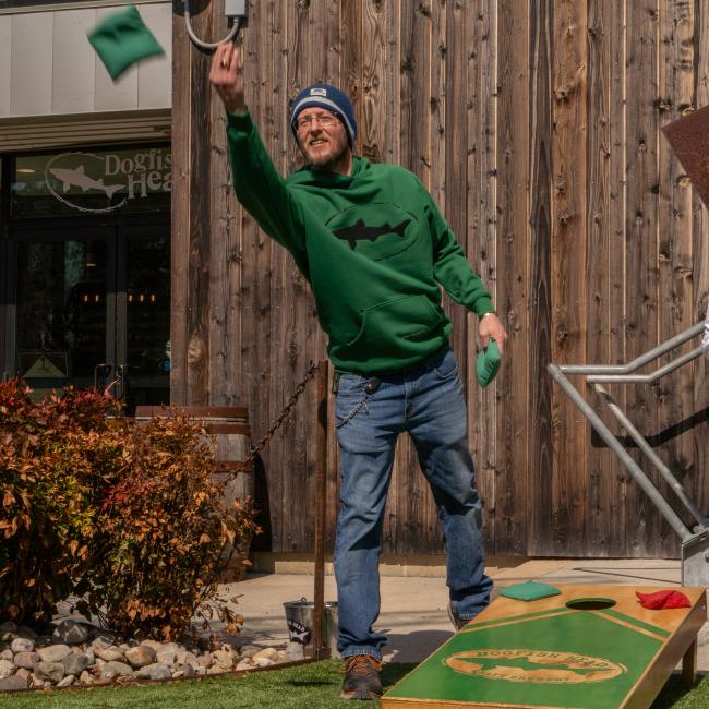 A green boathouse heavyweight sweatshirt with the Dogfish Head logo embroidered in black on the front.