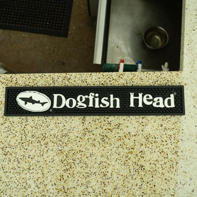 Dogfish Head Rail Bar Mat In Black With White Dogfish Head Name and Logo