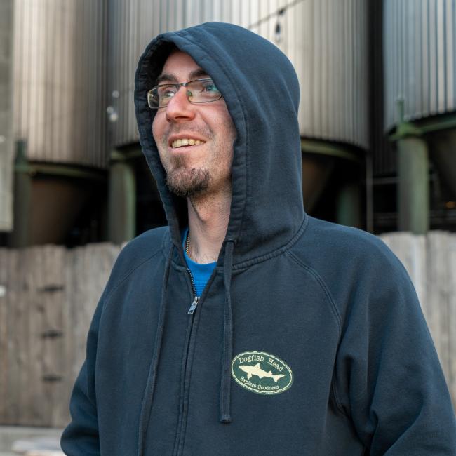 Displaying navy hoodie with hood up