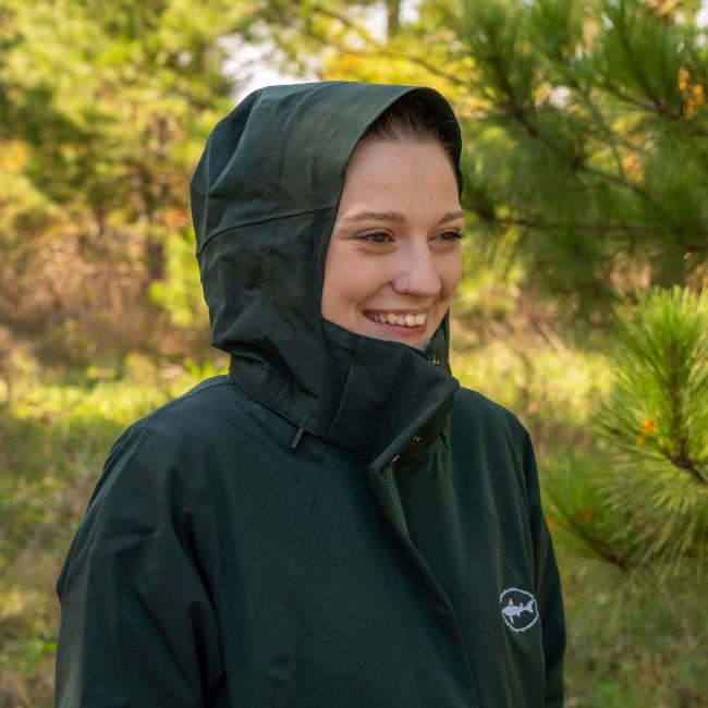 Dogfish Head and Patagonia Women's Dark Green 3-in-1 Parka Smooth Side with Hood Up on Model