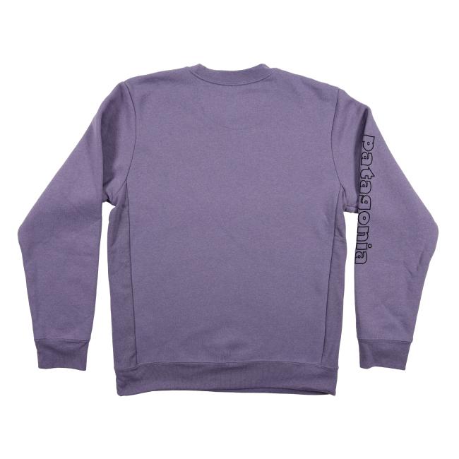 Back view of the purple Patagonia sweatshirt with no graphics on the back panel, but “patagonia” is printed vertically in black on the right sleeve.