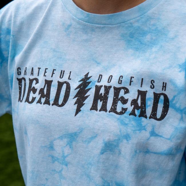 Close-up of the chest print showing “GRATEFUL DOGFISH DEAD HEAD” with a stylized lightning bolt separating the words.