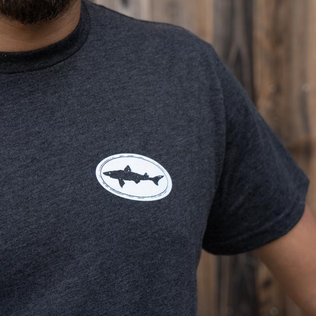 Charcoal Explore Goodness Tee in Dark Grey with Dogfish Head Shark in White Close up View of The Front