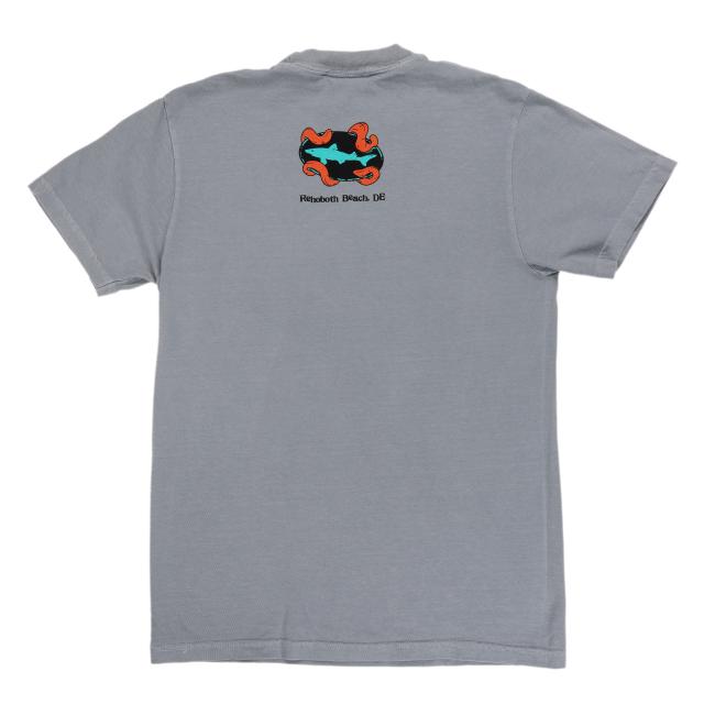 Back of a gray t-shirt with a small Dogfish Head logo encircled by red-orange tentacles above the text “Rehoboth Beach, DE.”