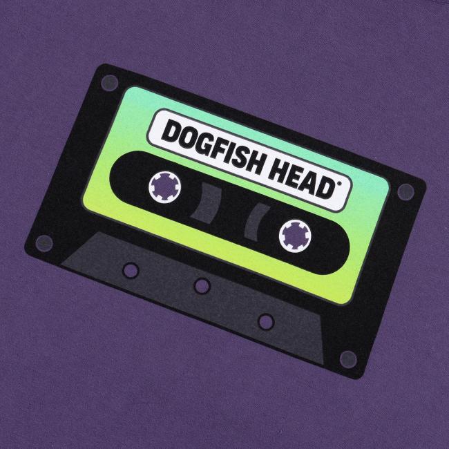 Close-up of the neon green and black cassette tape design on the front chest with 